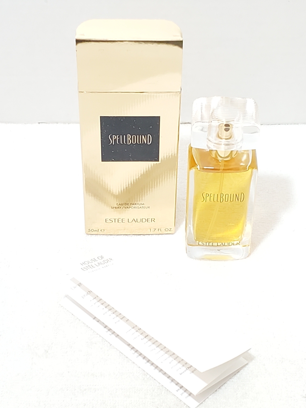 Estee Lauder Spellbound Eau de Parfum EDP Spray 1.7 oz 50ml Classic Gold Box NIB - Picture 2 of 10